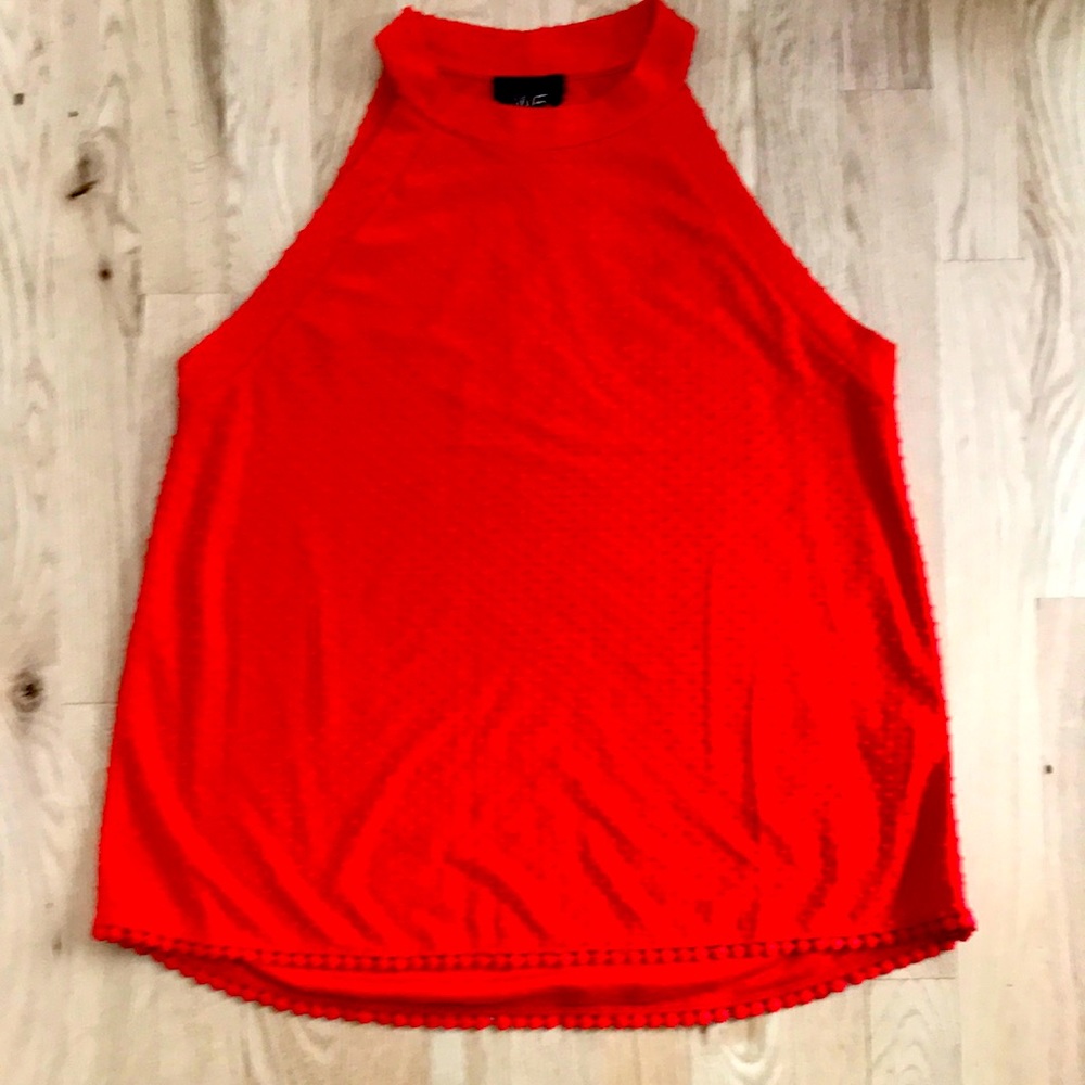 W5 sleeveless top. Bright red with pundit pattern. Detailed trim hemline. Size M